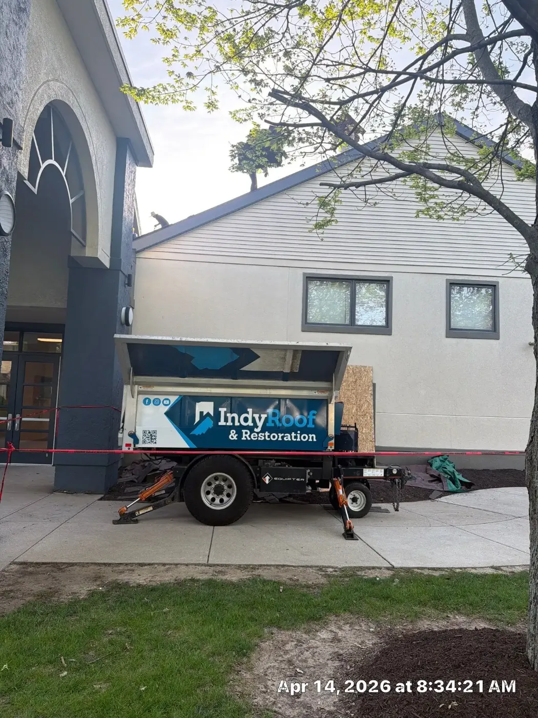 Tarping and dry-in on a Elwood commercial roof