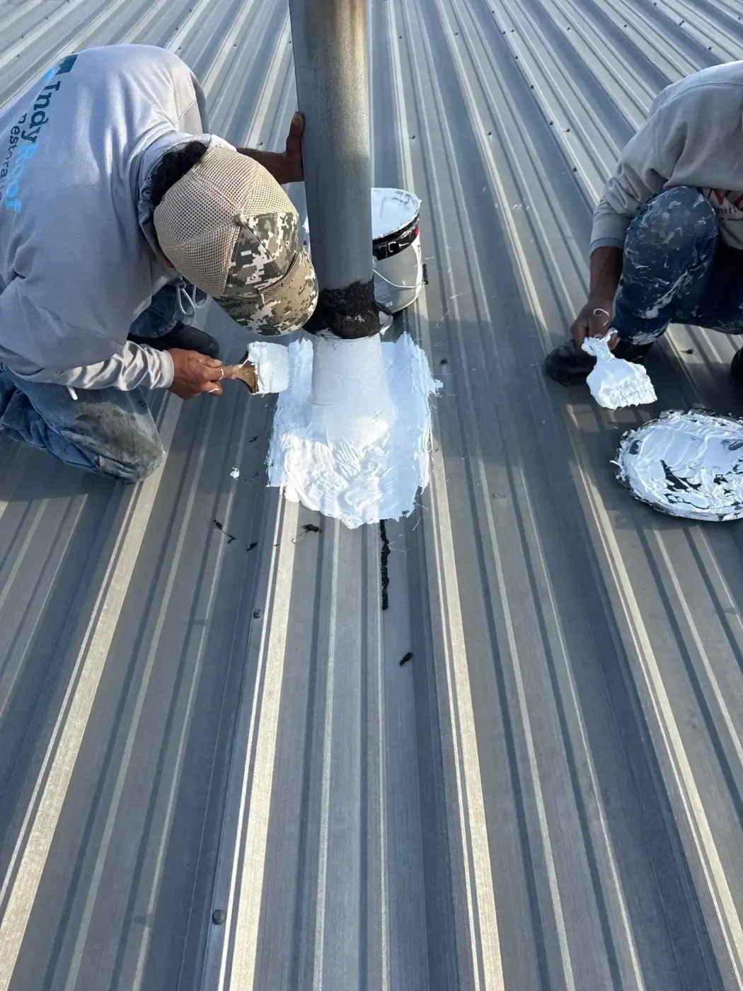 Tarping and dry-in on a Elwood commercial roof